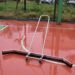 Squeegee Supreme: The Ultimate Rain Shuttle for Your Tennis Court and Parking Lot!